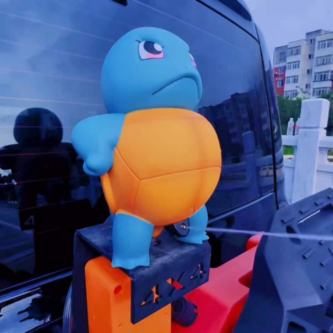 Figurina Spruzzatrice Auto — Un Getto D'Acqua Che Fa Sorridere